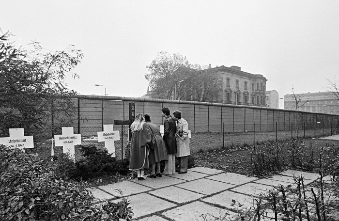 West Berliners at a memorial to East Germans who died trying to flee East Berlin, 1977